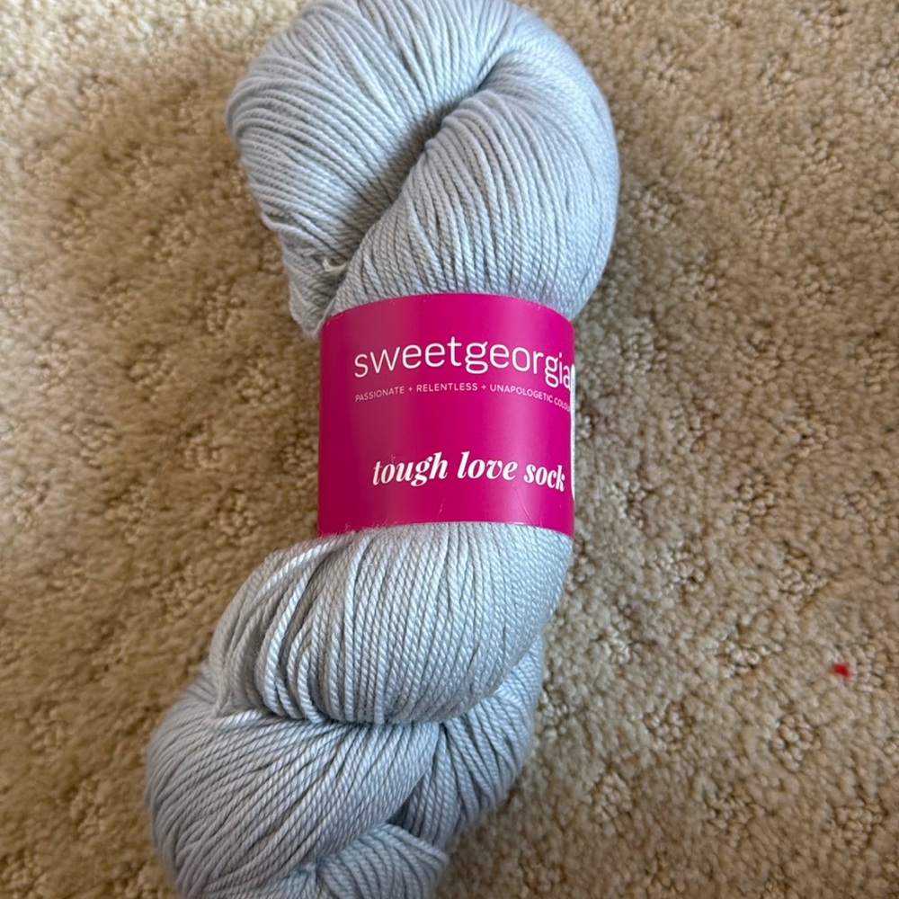 sweetgeorgia tough love sock yarn skein grey